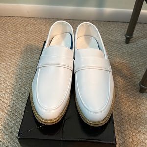 White leather loafers